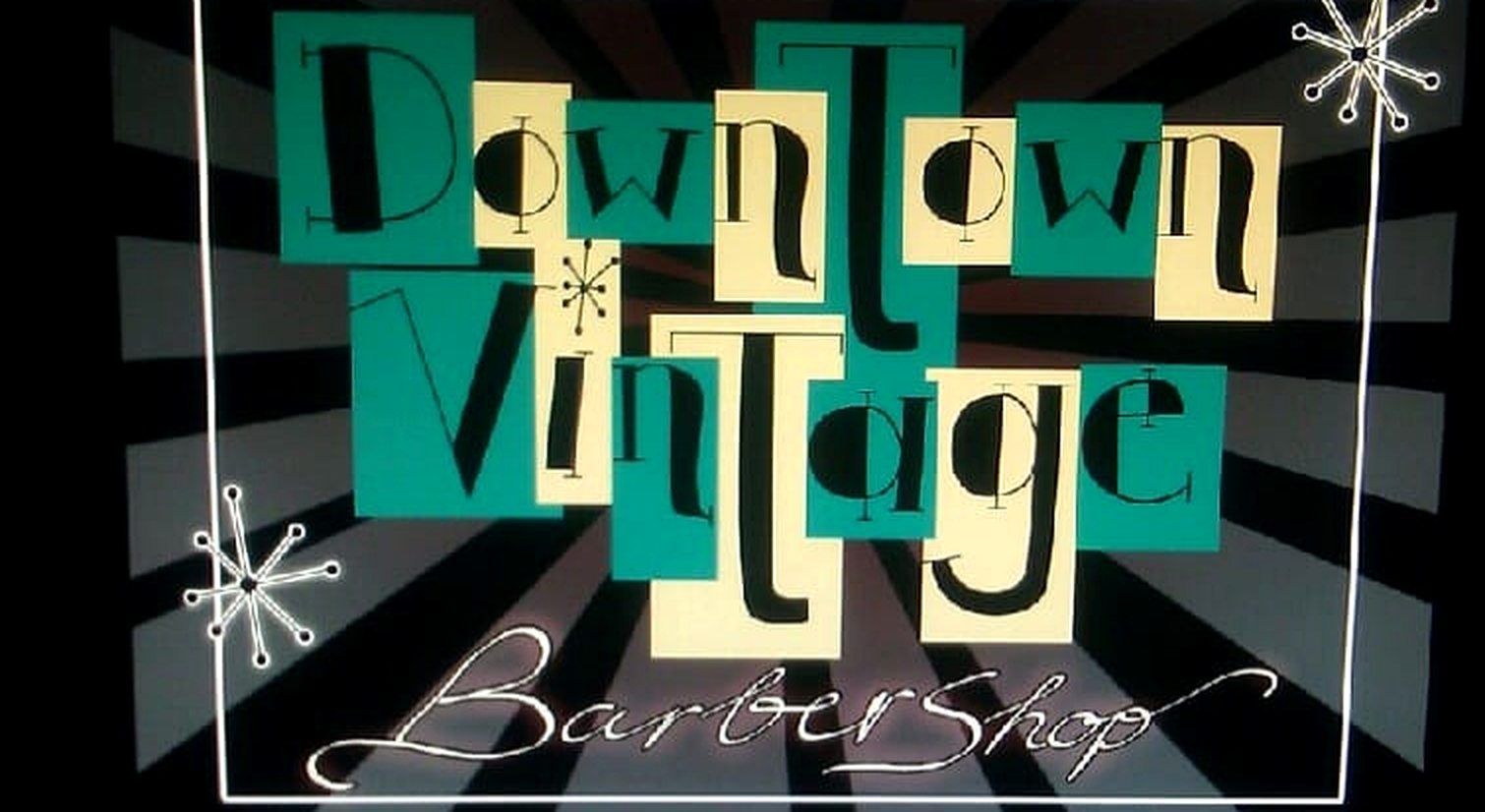 Downtown Vintage Barbershop logo